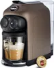 A Lavazza coffee machine with a cup of coffee and a coffee capsule. Podgląd zdjęcia produktu