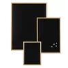 Three black chalkboards of different sizes with wooden frames are arranged together against a white background. Produktbild-Vorschau