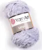 A ball of light purple, fuzzy yarn with a label. Produktbild-Vorschau
