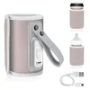 A collage of a portable baby bottle warmer and its accessories. Produktbild-Vorschau
