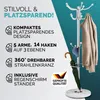 A white metal coat rack with a marble base, featuring a jacket, umbrella, and hat. Text highlights product features. Anteprima dell’immagine prodotto