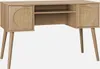 A light wood desk with rattan accents and angled legs, presented against a plain light gray background. Produktbild-Vorschau