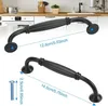 Two black cabinet handles are shown with measurement lines and text. Produktbild-Vorschau