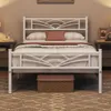 A white metal bed frame with a cloud-patterned headboard is shown in a bedroom setting. Produktbild-Vorschau