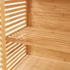 A close-up view of a slatted wooden shelf unit, likely made of bamboo, showing the texture and construction of the shelves and side panels. Produktbild-Vorschau