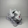 A rear view of a Nike Shox TL sneaker against a light gray background. Anteprima dell’immagine prodotto