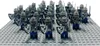 A group of LEGO knights standing on a grey LEGO baseplate. Náhled obrázku produktu