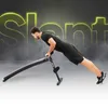 A man is performing a plank exercise on a slant board. The background has a smoky effect with large, glowing yellow text. Anteprima dell’immagine prodotto