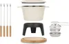A disassembled fondue set is laid out on a white background. Voir les images du produit