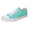 A single teal canvas sneaker with white laces and a white toe cap is shown against a white background. Produktbild-Vorschau