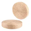 Two round woven floor cushions are shown against a white background. Voir les images du produit