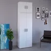 A tall, white, double-door cabinet is shown in a room with a gray wall and a chair. There are framed pictures on the wall. Produktbild-Vorschau
