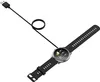 A smartwatch with a charging cable connected. Náhľad obrázku produktu