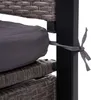 A close-up view of a gray cushion tied to a dark gray metal frame of a garden bench. Podgląd zdjęcia produktu