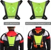 A collage of images showing a safety vest with LED turn signals and how it can be worn as a vest or attached to a backpack. Náhľad obrázku produktu