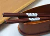 Wiederverwendbare Sushi-Essstäbchen aus dunklem Holz Produktbild-Vorschau 2
