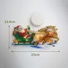 A Christmas-themed window decoration featuring Santa Claus in a sleigh pulled by reindeer, with lights illuminating the scene. Náhled obrázku produktu