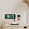 A charging stand for a smartphone and smartwatch is shown on a nightstand. Produktbild-Vorschau