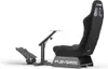 A black gaming chair with a pedal platform and a steering wheel mount, shown against a white background. Produktbild-Vorschau