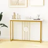 A narrow console table with a marble-look top and gold metal frame is displayed against a white wall. Náhľad obrázku produktu