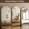 Three arched floor mirrors are shown in a bedroom setting, demonstrating different placement options. Anteprima dell’immagine prodotto