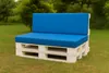 A pallet sofa with blue cushions sits on a grassy lawn with trees in the background. Produktbild-Vorschau