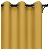 A close-up view of a yellow curtain with grommets hanging from a curtain rod. Náhled obrázku produktu