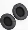 Two black headphone ear pads are shown from a top-down view on a white background. Anteprima dell’immagine prodotto