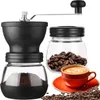 A coffee grinder set with a cup of coffee and coffee beans. Náhľad obrázku produktu