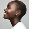 A profile shot of a woman wearing earrings. Produktbild-Vorschau