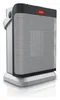A product shot of a silver and black ceramic heater with a red indicator light on top, placed on a reflective white surface. Produktbild-Vorschau
