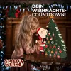 A young girl is interacting with a Christmas advent calendar shaped like a tree, with Santa Claus figure on it. Produktbild-Vorschau