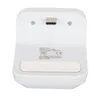 The back of a white charging dock for a game controller. Náhľad obrázku produktu