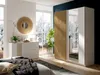 A bedroom scene featuring a dresser and a wardrobe with mirrored doors, set against a large window overlooking a snowy landscape. Náhled obrázku produktu