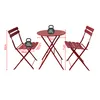A red metal bistro set with dimensions indicated by measurement lines and text labels. Náhľad obrázku produktu