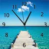 Wallario Design Wanduhr Steg am tropischen Meer aus Produktbild-Vorschau 1