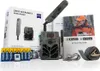 A product shot of a Zeiss Secacam 5 Wide-Angle trail camera kit, including the camera, batteries, cables, and documentation, arranged on a white background. Voir les images du produit