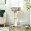A cat tree is placed in a living room setting next to a sofa. Náhled obrázku produktu