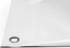 A close-up, angled view of a white PVC tarp with a metal grommet in the bottom left corner. Voir les images du produit