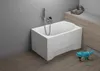 A white bathtub is shown in a bathroom setting with tiled walls and wooden flooring. A blue toy dinosaur is on the floor next to the bathtub. Podgląd zdjęcia produktu