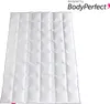 A white duvet is laid out flat on a white background, with a logo and text in the upper right corner. Produktbild-Vorschau
