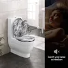 A split image showing a toilet with a decorative lid and a sleeping child. Produktbild-Vorschau