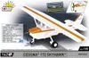 A model of a white and orange Cessna 172 Skyhawk airplane is displayed on a gray and white background, with product information and branding. Náhľad obrázku produktu