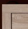 A close-up view of the corner of a wooden furniture piece, showing wood grain and joinery. Produktbild-Vorschau