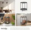 Collage of lifestyle shots and a product shot of a black side table in different room settings. Produktbild-Vorschau