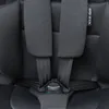 A close-up view of a car seat's harness system. Produktbild-Vorschau