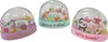 Three glitter globes with different designs and text on their bases. Produktbild-Vorschau