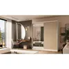 A bedroom scene featuring a large sliding door wardrobe with mirrored and slatted doors, a dressing table with a round mirror, and a chair. Produktbild-Vorschau