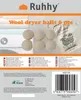 A product package for wool dryer balls, showing the balls and a storage bag, with a washing machine in the background. Náhled obrázku produktu