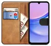 A book-style phone case with a phone inserted, showing a card and banknotes inside. Voir les images du produit